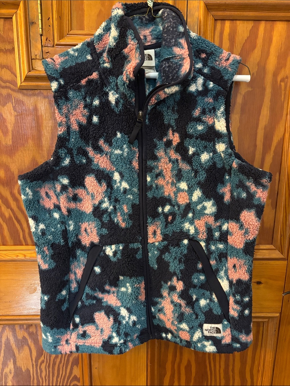The North Face Navy Sherpa Fleece Vest with Pink, Teal & White Pattern